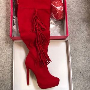 Brand new in box thigh high tassel boots